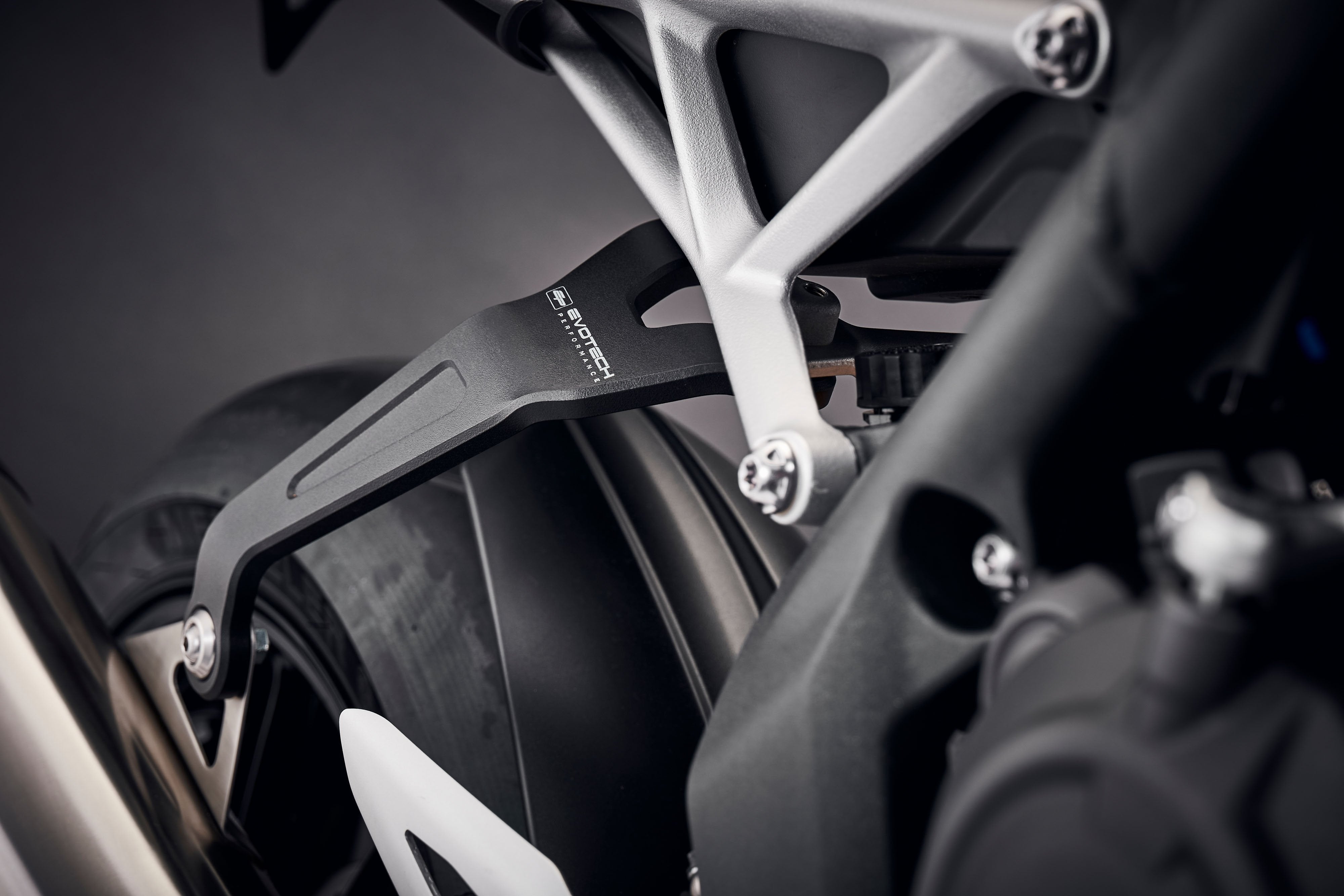 Evotech Exhaust Hanger (Black) - Triumph Speed Triple 1200 RS (2025+)